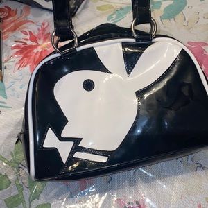 Beautiful brand-new retro black-and-white play boy logo handbag